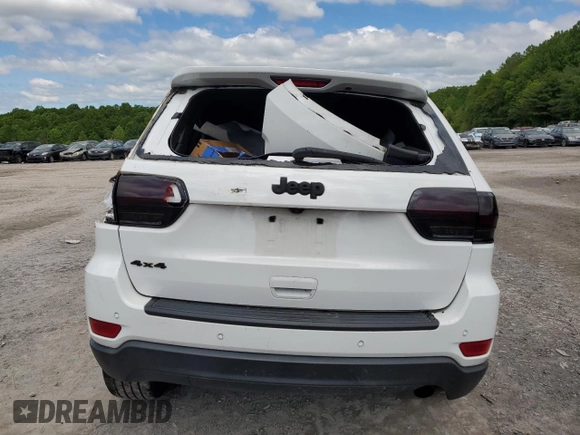 2016 Jeep Grand Cherokee Laredo z VIN 1C4RJFAG5GC399631, wystawiony jako Copart lot #55294584 z przebiegiem Nie podano mil oraz Nie do naprawy • Non repairable. Historia ofert i sprzedaży dostępna na DreamBid. Obrazek 6.