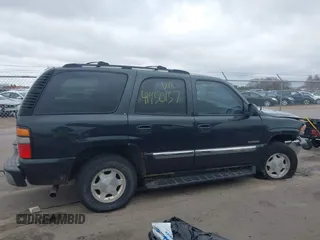 2004 GMC Yukon SLT with VIN 1GKEK13Z24J113954, listed as a IAAI auction lot 41950157 with 174,021 mi miles. Bid and sale history available at carsss.com. Image 14.