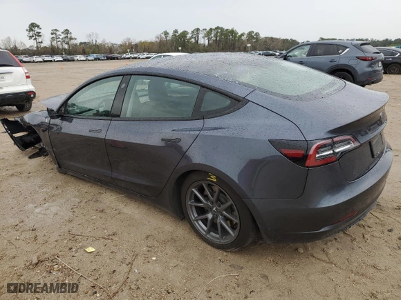 2023 Tesla Model 3 with VIN 5YJ3E1EA6PF399949, listed as a Copart auction lot 88917915 with 20,950 mi miles and Salvage Title. Bid and sale history available at carsss.com. Image 2.