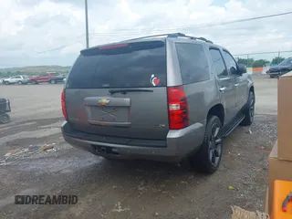 2007 Chevrolet Tahoe LT z VIN 1GNFK13077J372162, wystawiony jako IAAI lot #42656552 z przebiegiem 218 352 mil mil oraz . Historia ofert i sprzedaży dostępna na DreamBid. Obrazek 4.