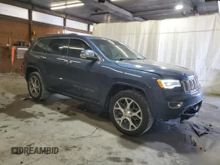 2020 Jeep Grand Cherokee Overland with VIN 1C4RJFCG4LC231616, listed as a Copart auction lot 49303645 with 66,043 mi miles and Salvage Title. Bid and sale history available at DreamBid. Image 4.