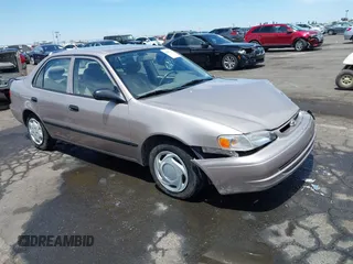 2000 Toyota Corolla VE with VIN 1NXBR12E0YZ407281, listed as a IAAI auction lot 42607475 with 109,476 mi miles and . Bid and sale history available at DreamBid. Image 1.