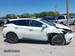 2018 Nissan Murano S z VIN 5N1AZ2MG8JN186092, wystawiony jako IAAI lot #42042539 z przebiegiem 77 017 mil mil oraz . Historia ofert i sprzedaży dostępna na DreamBid. Obrazek 13.
