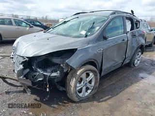 2013 Ford Escape SE with VIN 1FMCU9GX6DUA83081, listed as a IAAI auction lot 41991167 with 106,793 mi miles and . Bid and sale history available at DreamBid. Image 2.