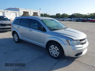2014 Dodge Journey SE with VIN 3C4PDCAB0ET221998, listed as a IAAI auction lot 40609907 with 203,241 mi miles and . Bid and sale history available at carsss.com. Image 1.