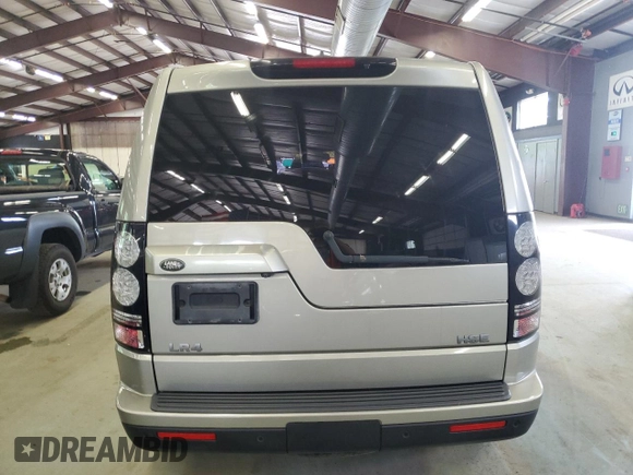 2014 Land Rover LR4 Lux z VIN SALAK2V65EA723957, wystawiony jako Copart lot #57784825 z przebiegiem 99 009 mil mil oraz Czysty tytuł • Clean title. Historia ofert i sprzedaży dostępna na DreamBid. Obrazek 6.