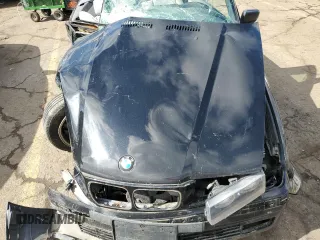 1999 BMW 3 Series 328ic with VIN WBABK7333XET67499, listed as a Copart auction lot 72788094 with 0 mi miles and Clean Title. Bid and sale history available at carsss.com. Image 11.