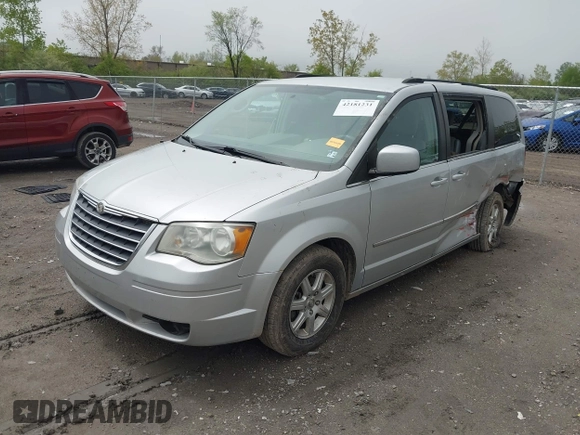 2010 Chrysler Town & Country Touring with VIN 2A4RR5D14AR271397, listed as a IAAI auction lot 42181231 with 200,547 mi miles and . Bid and sale history available at DreamBid. Image 2.