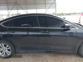 2015 Chrysler 200 Limited with VIN 1C3CCCAB2FN719935, listed as a IAAI auction lot 42191027 with 156,132 mi miles and . Bid and sale history available at DreamBid. Image 13.
