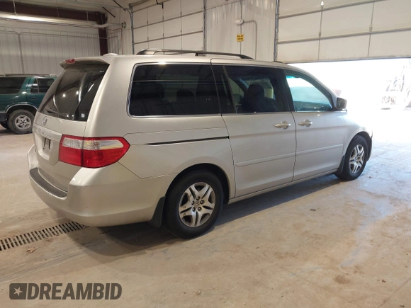 2006 Honda Odyssey EX-L with VIN 5FNRL387X6B449343, listed as a IAAI auction lot 42162759 with 242,590 mi miles. Bid and sale history available at carsss.com. Image 4.