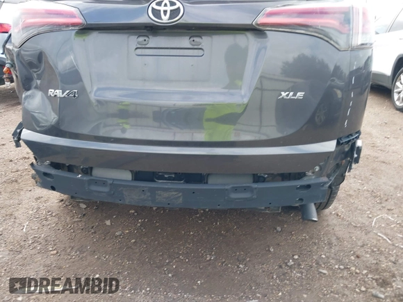 2018 Toyota RAV4 XLE with VIN 2T3WFREV4JW417555, listed as a IAAI auction lot 41092589 with 93,788 mi miles and . Bid and sale history available at DreamBid. Image 6.