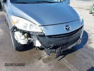 2013 Mazda 5 Sport with VIN JM1CW2BL6D0146696, listed as a IAAI auction lot 41657255 with 142,939 mi miles and . Bid and sale history available at DreamBid. Image 6.