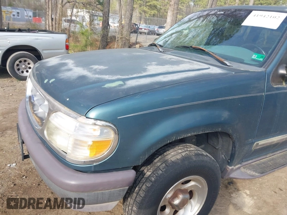 1997 Ford Explorer XL z VIN 1FMDU34E9VZB67632, wystawiony jako IAAI lot #41942102 z przebiegiem 295 240 mil mil oraz . Historia ofert i sprzedaży dostępna na DreamBid. Obrazek 6.