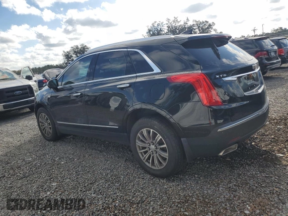 2017 Cadillac XT5 Premium Luxury FWD z VIN 1GYKNCRS7HZ130553, wystawiony jako Copart lot #60337905 z przebiegiem Nie podano mil oraz Szkoda całkowita • Salvage title. Historia ofert i sprzedaży dostępna na DreamBid. Obrazek 2.