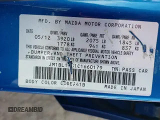 2012 Mazda 3 i Touring with VIN JM1BL1L81C1660179, listed as a Copart auction lot 55301335 with 159,677 mi miles and Clean Title. Bid and sale history available at DreamBid. Image 12.