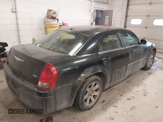 2007 Chrysler 300 with VIN 2C3LA43R17H860639, listed as a IAAI auction lot 41481326 with 163,837 mi miles. Bid and sale history available at carsss.com. Image 4.