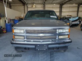 1999 Chevrolet Tahoe Z71 z VIN 1GNEK13R2XJ338897, wystawiony jako Copart lot #54219225 z przebiegiem 232 020 mil mil oraz Szkody całkowita. Historia ofert i sprzedaży dostępna na DreamBid. Obrazek 5.