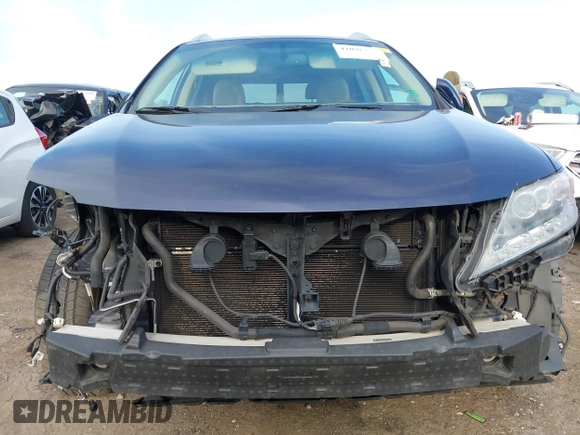 2013 Lexus RX 450h z VIN JTJBC1BA4D2052072, wystawiony jako IAAI lot #42076657 z przebiegiem 138 396 mil mil oraz . Historia ofert i sprzedaży dostępna na DreamBid. Obrazek 13.