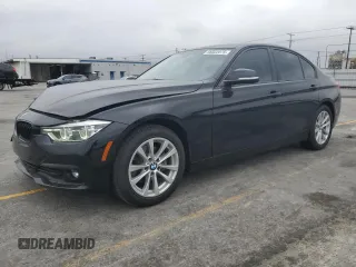2018 BMW 3 Series 320i z VIN WBA8A9C55JAH14603, wystawiony jako Copart lot #56022075 z przebiegiem 52 229 mil mil oraz Szkoda całkowita • Salvage title. Historia ofert i sprzedaży dostępna na DreamBid. Obrazek 1.