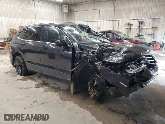 2023 Volkswagen Tiguan SE with VIN 3VVMB7AX3PM021515, listed as a Copart auction lot 57981775 with 23,885 mi miles and Salvage title. Bid and sale history available at DreamBid. Image 4.