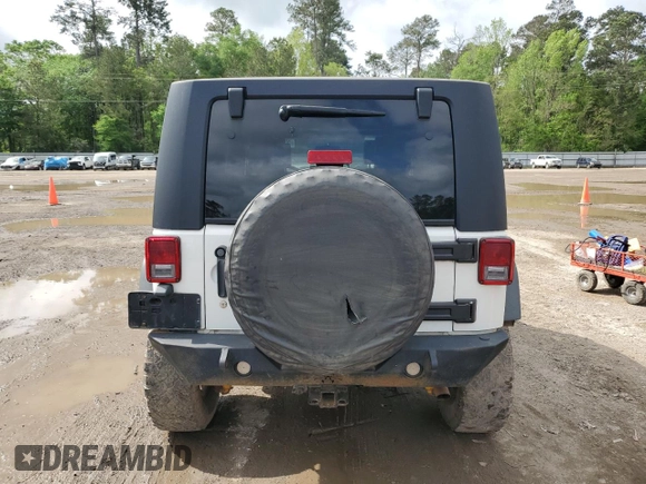2008 Jeep Wrangler Rubicon z VIN 1J8GA69198L614736, wystawiony jako Copart lot #50826545 z przebiegiem 124 801 mil mil oraz Czysty tytuł • Clean title. Historia ofert i sprzedaży dostępna na DreamBid. Obrazek 6.
