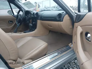 2002 Mazda MX-5 Miata Cloth z VIN JM1NB353620221304, wystawiony jako IAAI lot #41178747 z przebiegiem 98 958 mil mil oraz . Historia ofert i sprzedaży dostępna na DreamBid. Obrazek 5.