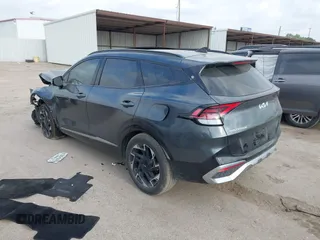 2024 Kia Sportage SX-Prestige with VIN 5XYK53DF7RG200178, listed as a IAAI auction lot 42068886 with 15,907 mi miles and . Bid and sale history available at DreamBid. Image 3.