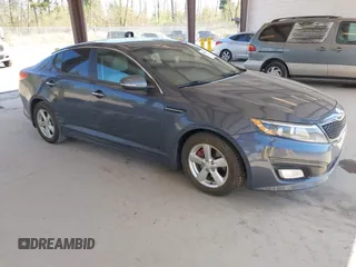 2015 Kia Optima LX with VIN KNAGM4A70F5592109, listed as a IAAI auction lot 42053533 with 159,401 mi miles. Bid and sale history available at carsss.com. Image 1.