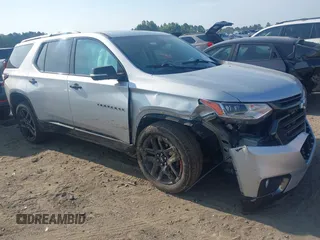 2018 Chevrolet Traverse Premier z VIN 1GNEVJKW7JJ284650, wystawiony jako IAAI lot #42151086 z przebiegiem 141 161 mil mil oraz . Historia ofert i sprzedaży dostępna na DreamBid. Obrazek 1.
