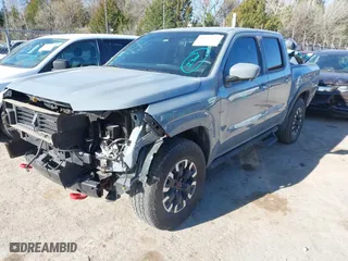 2023 Nissan Frontier PRO-4X with VIN 1N6ED1EK7PN670665, listed as a IAAI auction lot 41785130 with 21,561 mi miles. Bid and sale history available at carsss.com. Image 2.