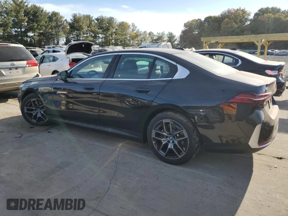 2024 BMW i5 eDrive40 with VIN WBY33FK06RCR89436, listed as a Copart auction lot 76718924 with 0 mi miles and Salvage Title. Bid and sale history available at carsss.com. Image 2.