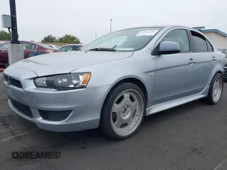 2014 Mitsubishi Lancer ES with VIN JA32U2FU1EU021683, listed as a IAAI auction lot 42040316 with 82,266 mi miles and . Bid and sale history available at DreamBid. Image 2.