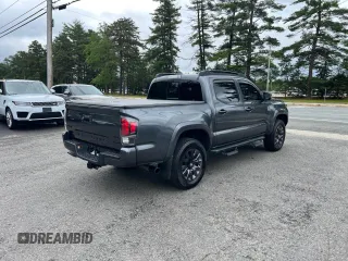 2022 Toyota Tacoma Limited with VIN 3TMGZ5AN7NM458988, listed as a Copart auction lot 65398105 with 32,115 mi miles and Salvage title. Bid and sale history available at DreamBid. Image 4.