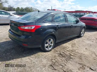 2014 Ford Focus SE with VIN 1FADP3F27EL189068, listed as a IAAI auction lot 42047538 with 196,785 mi miles. Bid and sale history available at carsss.com. Image 4.