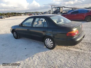 1998 Chevrolet Prizm with VIN 1Y1SK5284WZ423764, listed as a Copart auction lot 85463294 with 203,698 mi miles and Salvage Title. Bid and sale history available at carsss.com. Image 2.