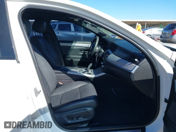 2014 BMW 5 Series 528i with VIN WBA5A5C50ED503130, listed as a IAAI auction lot 41819922 with 135,923 mi miles. Bid and sale history available at carsss.com. Image 5.