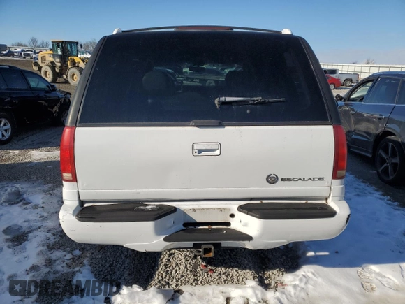 1999 Cadillac Escalade z VIN 1GYEK13R3XR406970, wystawiony jako Copart lot #87623365 z przebiegiem 189 339 mil mil oraz Szkoda całkowita • Salvage title. Historia ofert i sprzedaży dostępna na DreamBid. Obrazek 6.