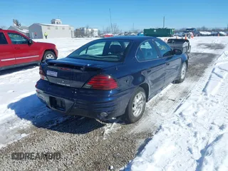 2004 Pontiac Grand Am SE with VIN 1G2NE52F24M692805, listed as a IAAI auction lot 41591014 with 137,072 mi miles. Bid and sale history available at carsss.com. Image 4.