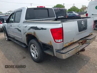 2006 Nissan Titan SE with VIN 1N6AA07BX6N562442, listed as a IAAI auction lot 42411727 with 203,862 mi miles and . Bid and sale history available at DreamBid. Image 3.