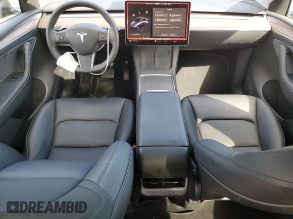 2024 Tesla Model Y Long Range with VIN 7SAYGAEE8RF987571, listed as a Copart auction lot 55110485 with 19,732 mi miles and Salvage title. Bid and sale history available at DreamBid. Image 8.