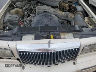1995 Lincoln Town Car Cartier z VIN 1LNLM83W2SY603452, wystawiony jako Copart lot #55756595 z przebiegiem 243 394 mil mil oraz Szkody całkowita. Historia ofert i sprzedaży dostępna na DreamBid. Obrazek 11.