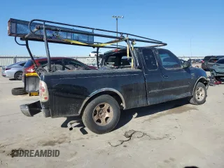 1999 Ford F-150 с VIN 2FTZX1729XCA25031, выставлен на аукционе Copart как лот 46941615 с пробегом 310 800 миль миль и Списание • Salvage title. История ставок и продаж доступна на DreamBid. Изображение 3.