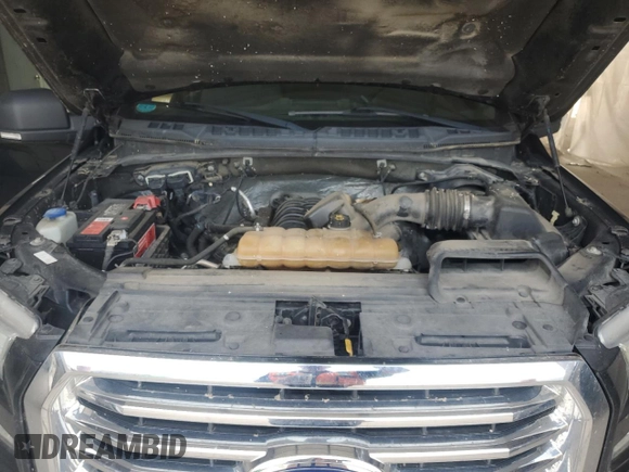 2015 Ford F-150 XLT with VIN 1FTEW1EF0FFA69722, listed as a Copart auction lot 59671695 with 189,690 mi miles and Salvage title. Bid and sale history available at DreamBid. Image 11.