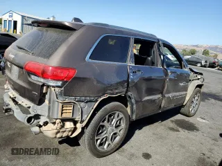 2019 Jeep Grand Cherokee Overland with VIN 1C4RJFCT7KC833390, listed as a Copart auction lot 74015774 with 64,598 mi miles and Salvage Title. Bid and sale history available at carsss.com. Image 3.