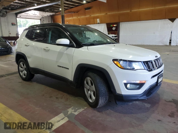 2020 Jeep Compass Latitude with VIN 3C4NJDBB8LT112495, listed as a Copart auction lot 60070765 with 63,055 mi miles and Salvage title. Bid and sale history available at DreamBid. Image 4.