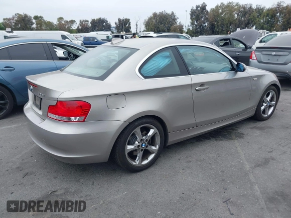 2009 BMW 1 Series 128i with VIN WBAUP93599VF48622, listed as a IAAI auction lot 42360145 with 64,913 mi miles and . Bid and sale history available at DreamBid. Image 4.