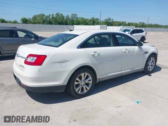 2011 Ford Taurus SEL z VIN 1FAHP2HW7BG148004, wystawiony jako IAAI lot #42245047 z przebiegiem 102 999 mil mil oraz . Historia ofert i sprzedaży dostępna na DreamBid. Obrazek 4.