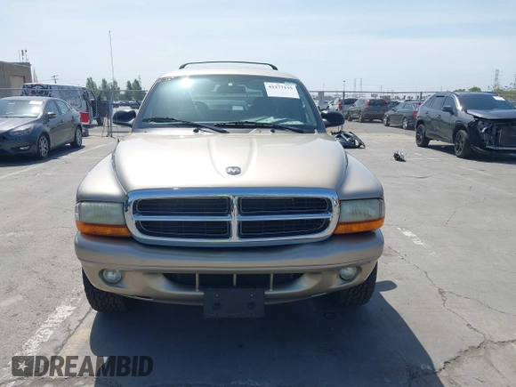 2003 Dodge Durango SLT z VIN 1D4HS48N43F517701, wystawiony jako IAAI lot #42277135 z przebiegiem 135 521 mil mil oraz . Historia ofert i sprzedaży dostępna na DreamBid. Obrazek 12.