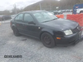 1999 Volkswagen Jetta GL z VIN 3VWRC29M4XM010213, wystawiony jako IAAI lot #41940994 z przebiegiem 257 435 mil mil oraz . Historia ofert i sprzedaży dostępna na DreamBid. Obrazek 1.