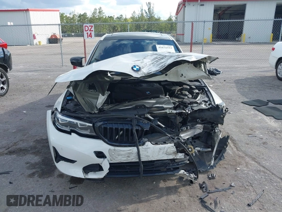 2019 BMW 3 Series 330i z VIN 3MW5R1J57K8A03673, wystawiony jako IAAI lot #41672322 z przebiegiem 72 083 mil mil oraz . Historia ofert i sprzedaży dostępna na DreamBid. Obrazek 12.